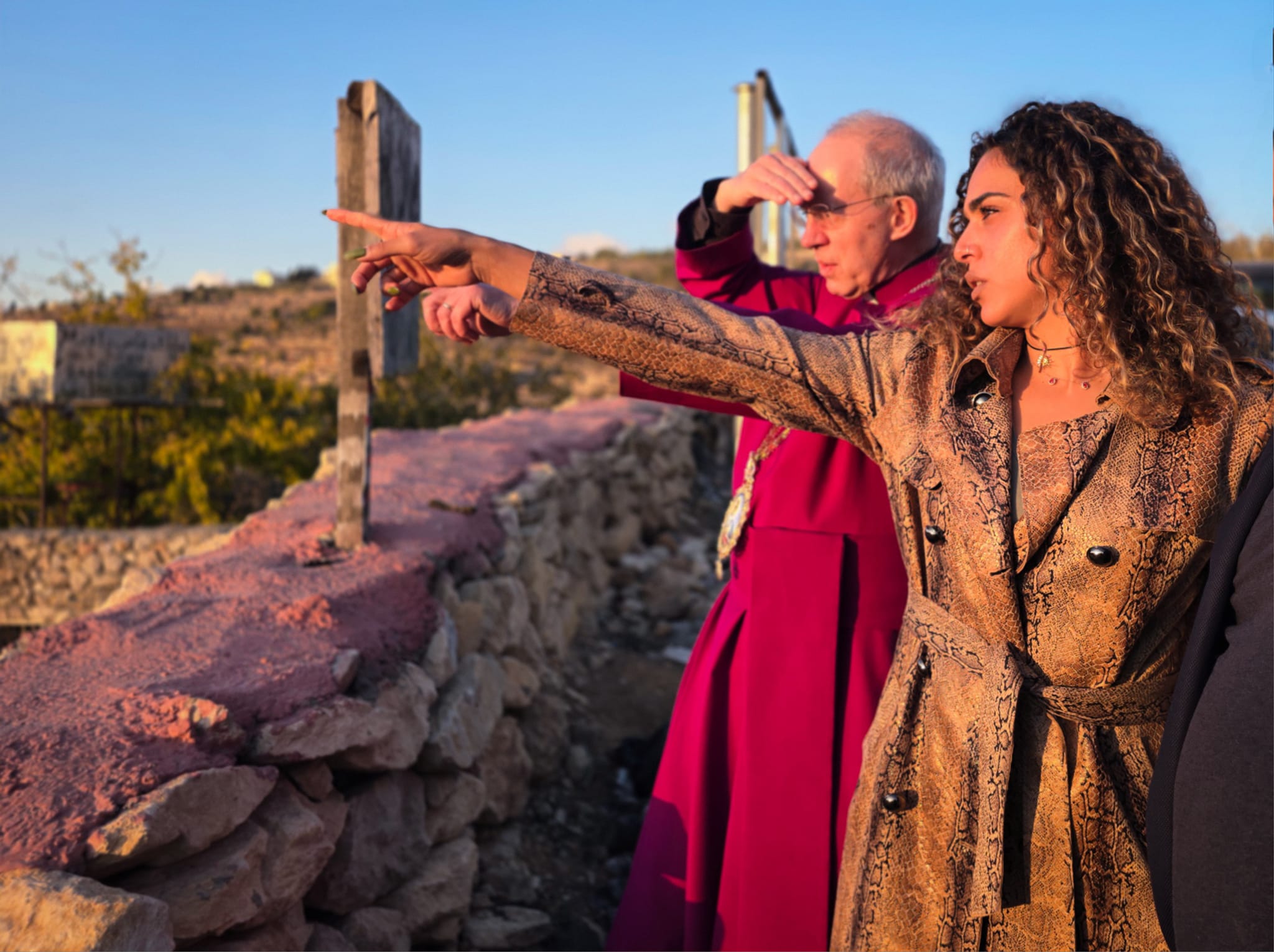 she points to their occupied property