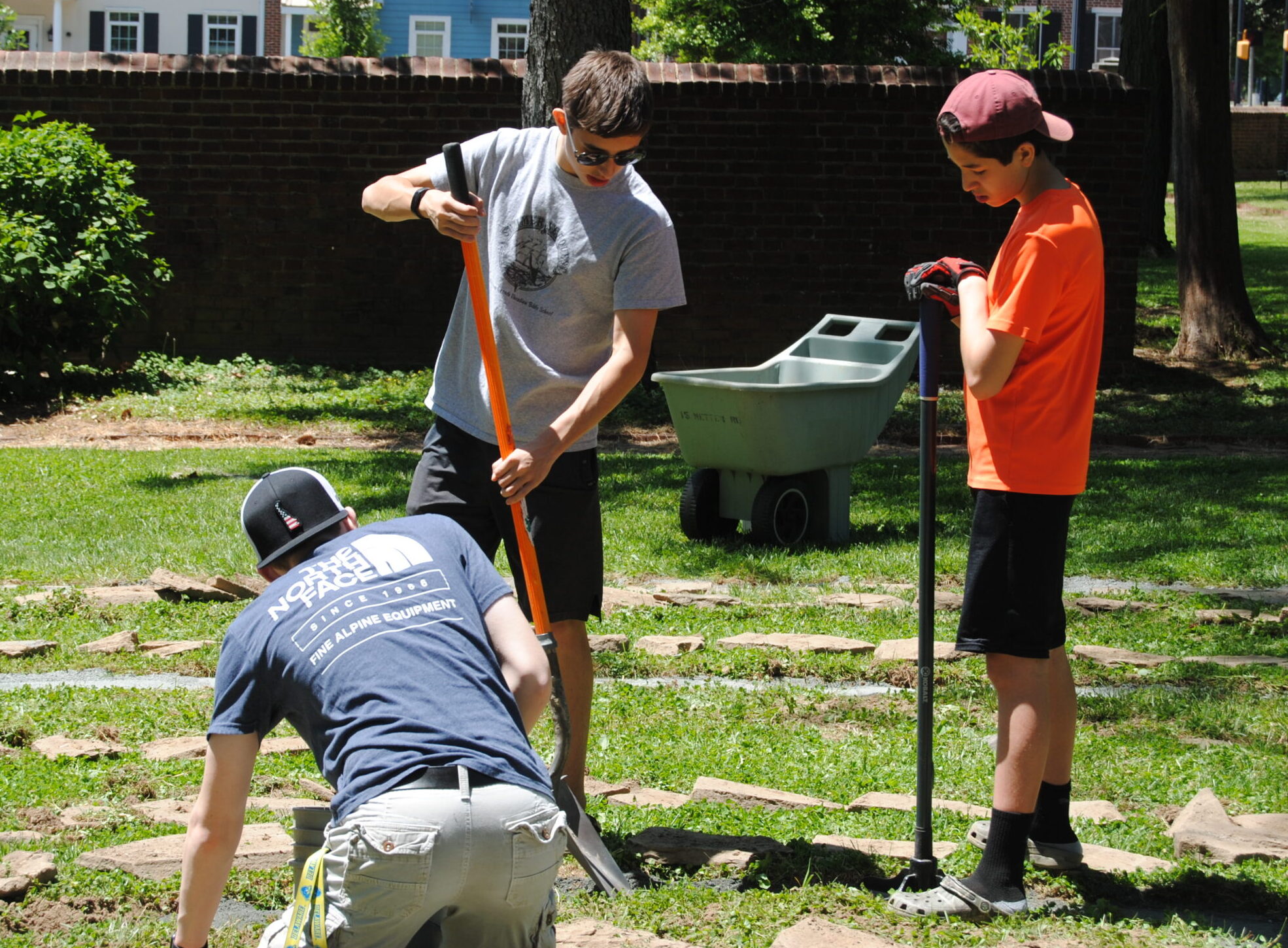 boy scouts working on a labryrinth in the church yard at Christ Church in Dover