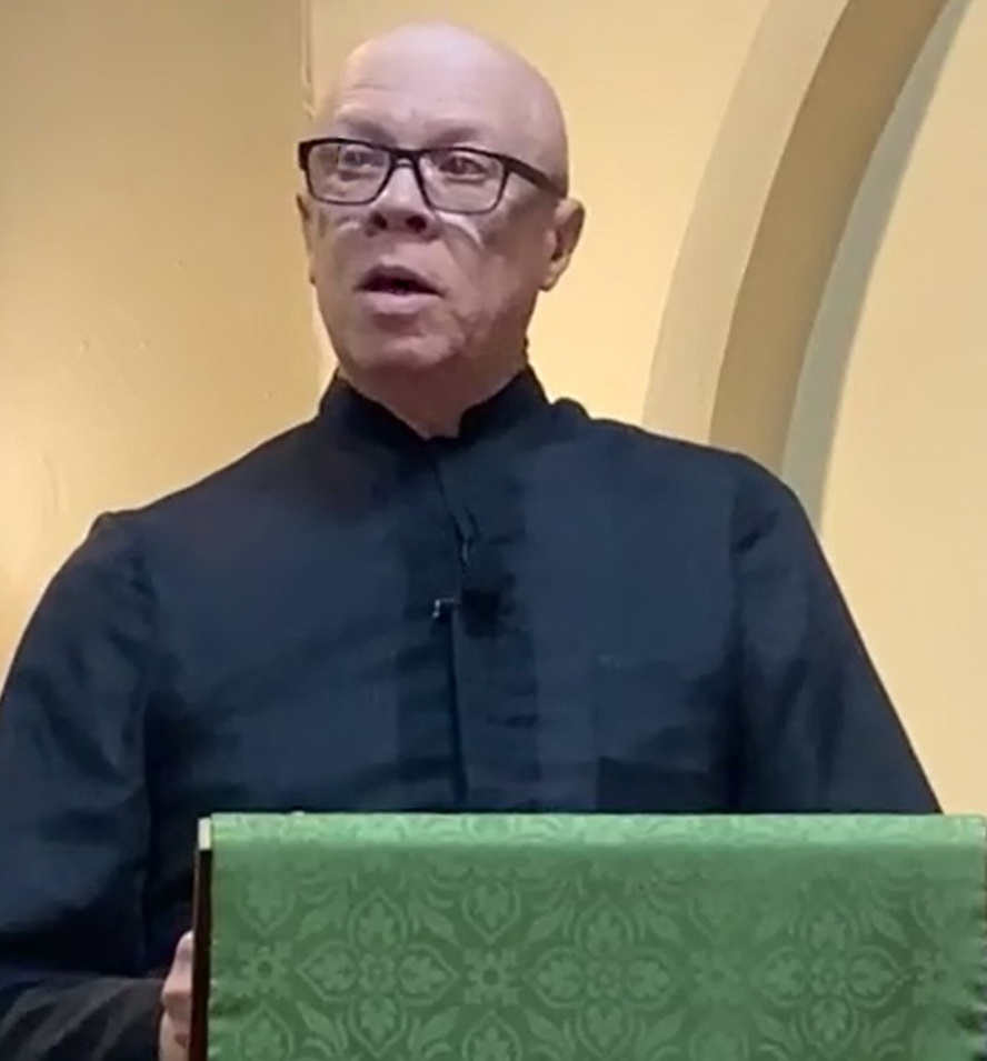 Herb Quick preaching from pulpit