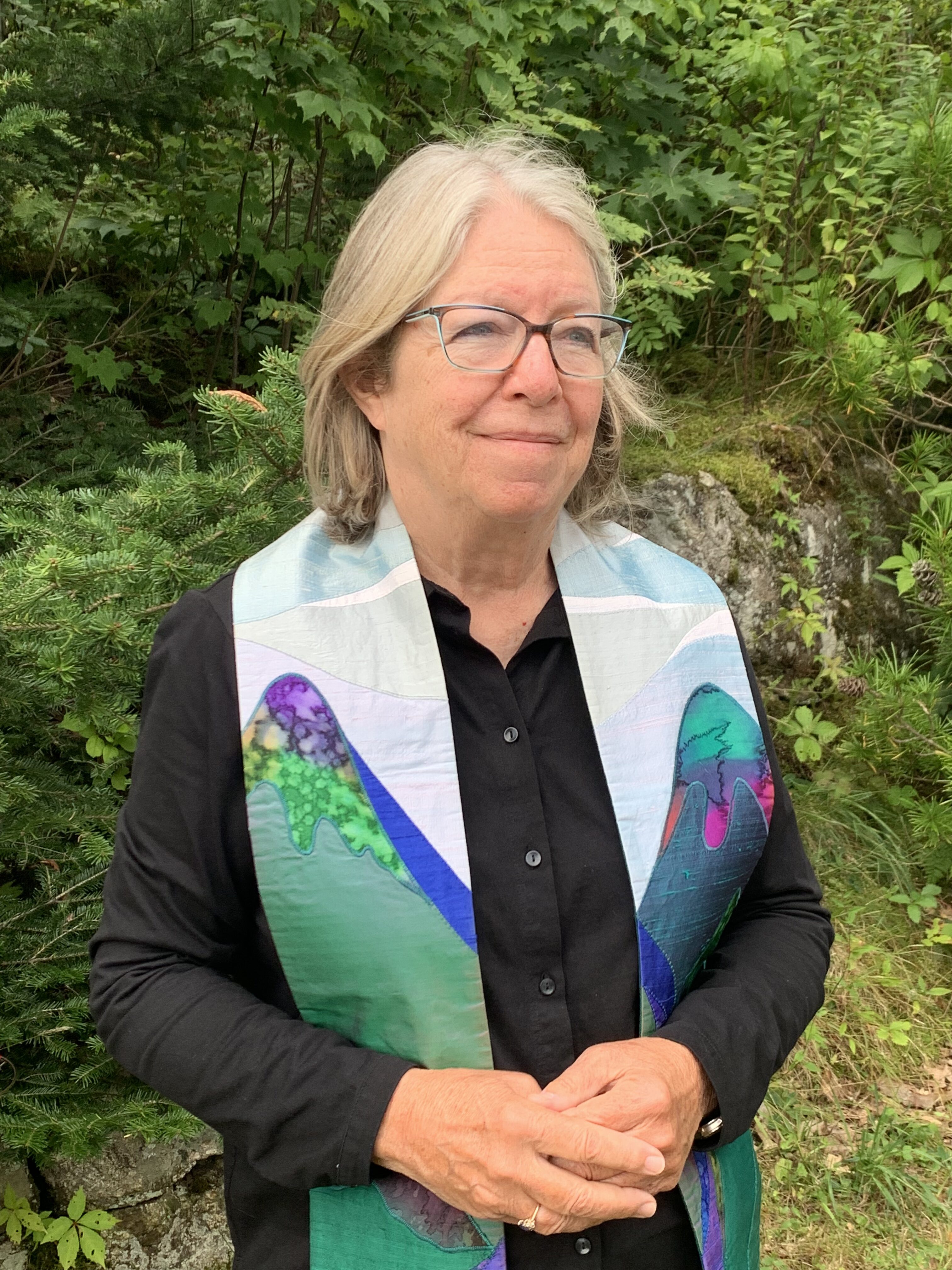 priest wearing stole that was handmade for her